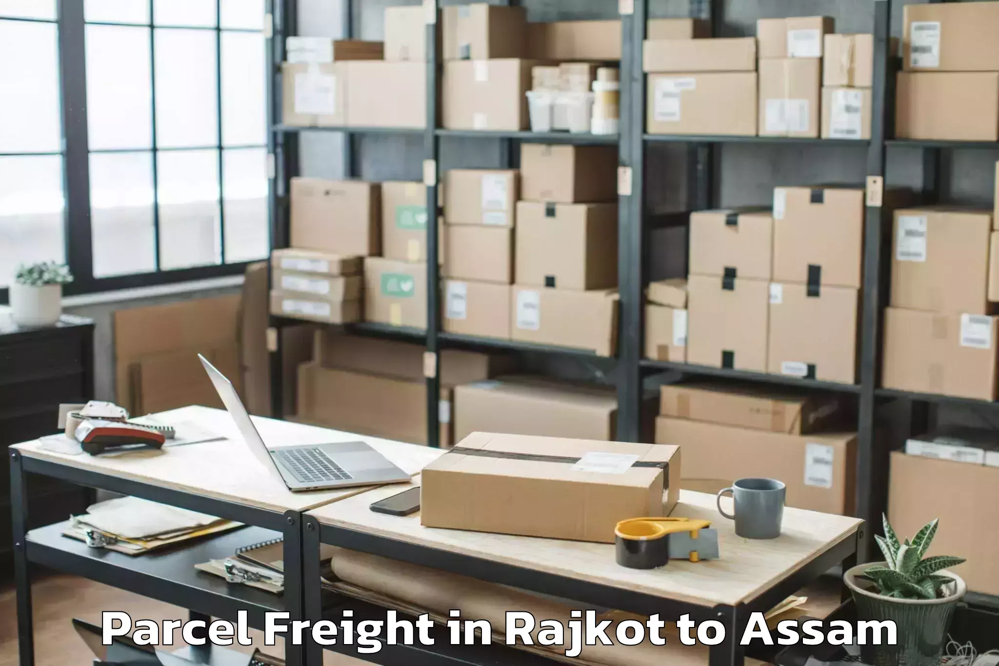 Book Rajkot to Baihata Parcel Freight Online